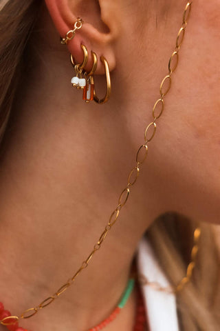 Single white blossom hoop gold