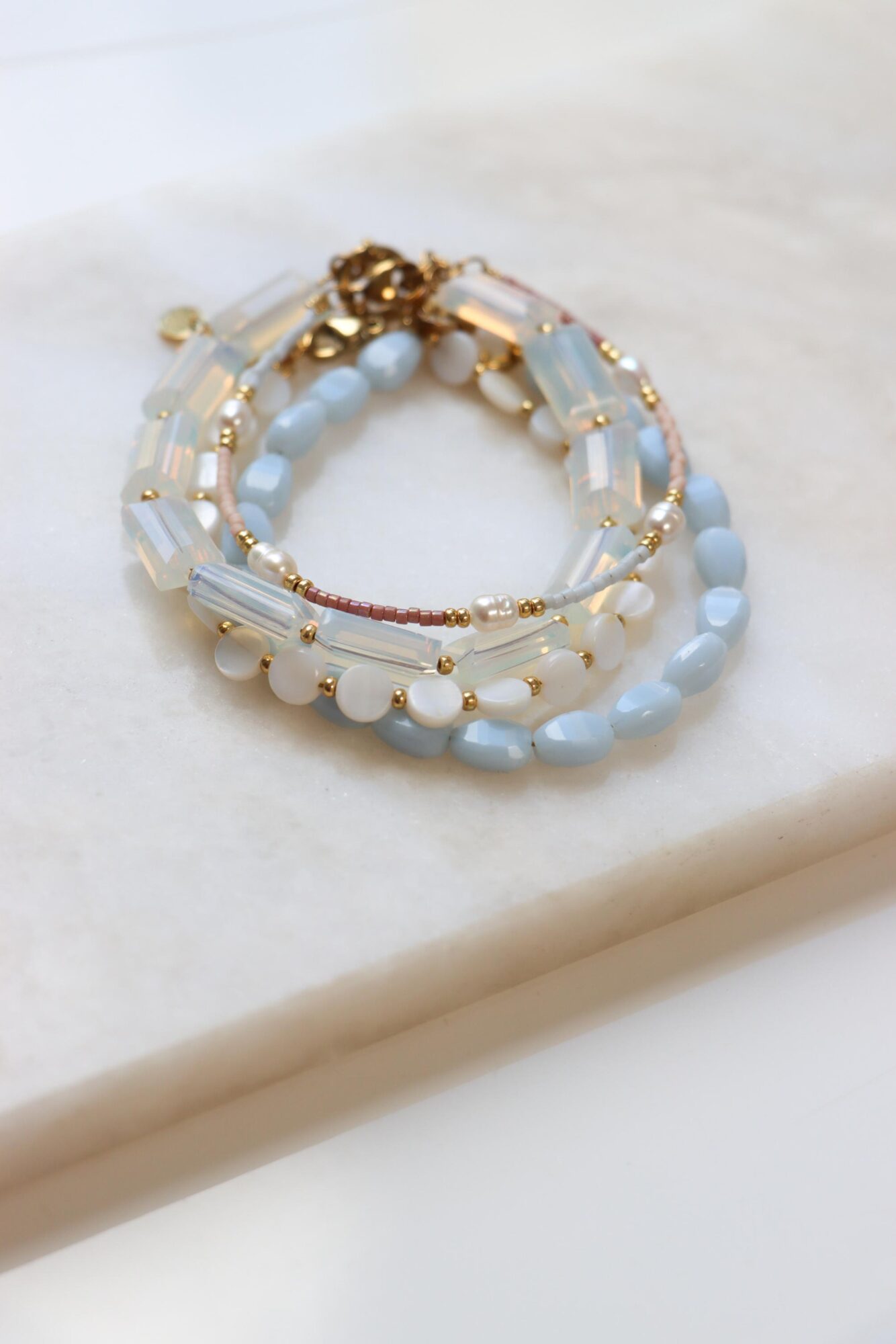 Shades of blue bracelet gold
