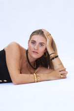 Black stones bracelet gold