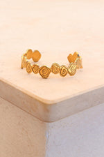 Twirl bangle gold