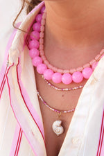 Fuchsia flame necklace gold