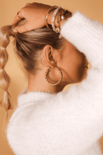 Single knotbound hoop gold