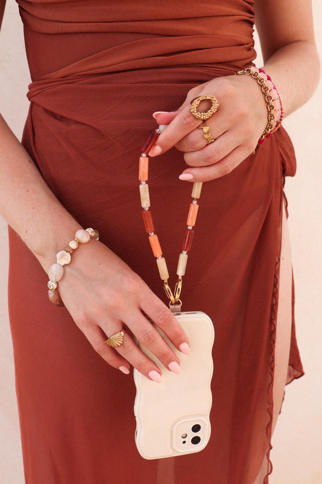 Cosmopolitan phone cord gold