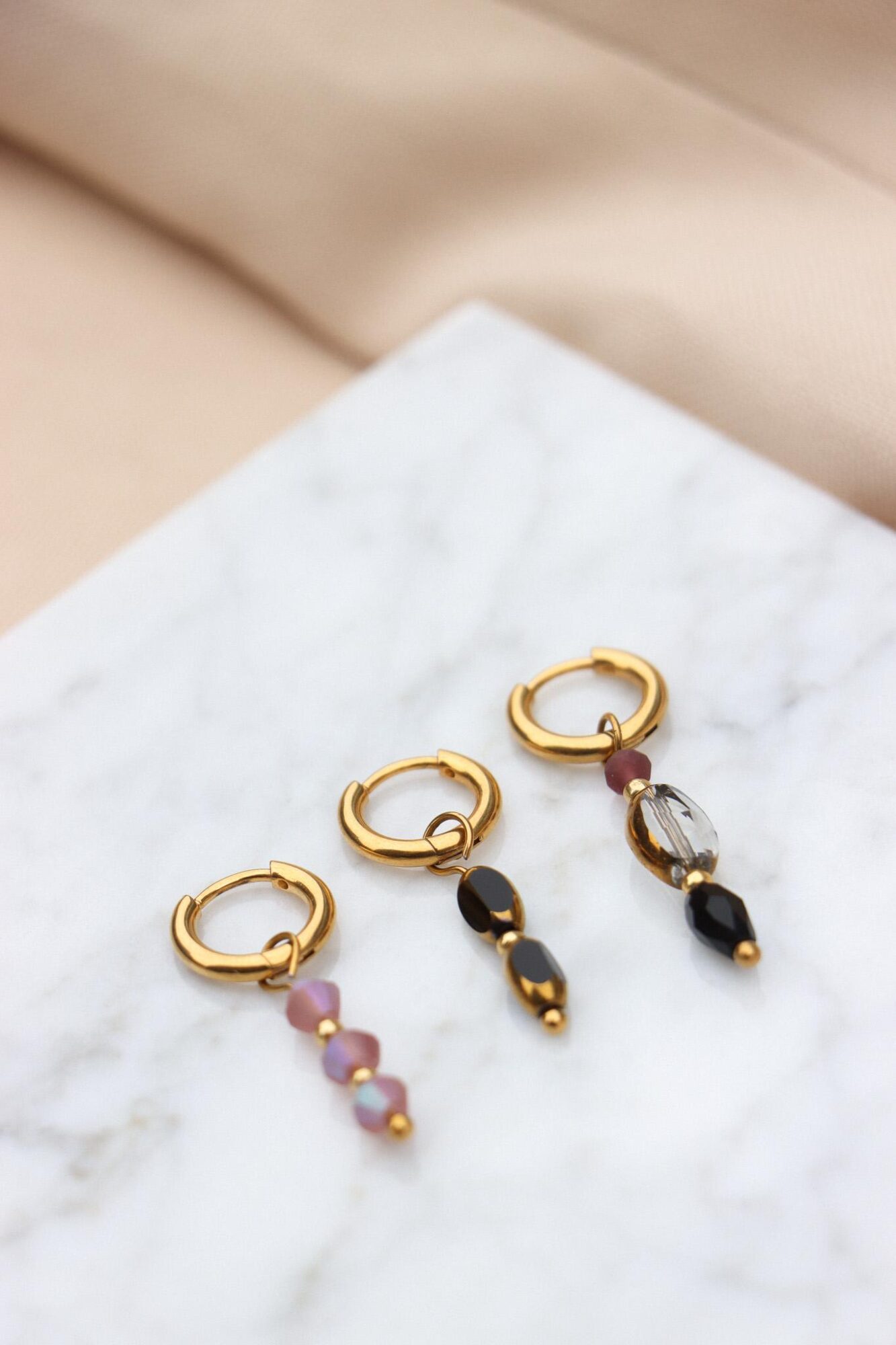 Noir glow hoop gold