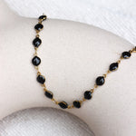 Black round bracelet gold