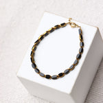 Noir glow bracelet gold