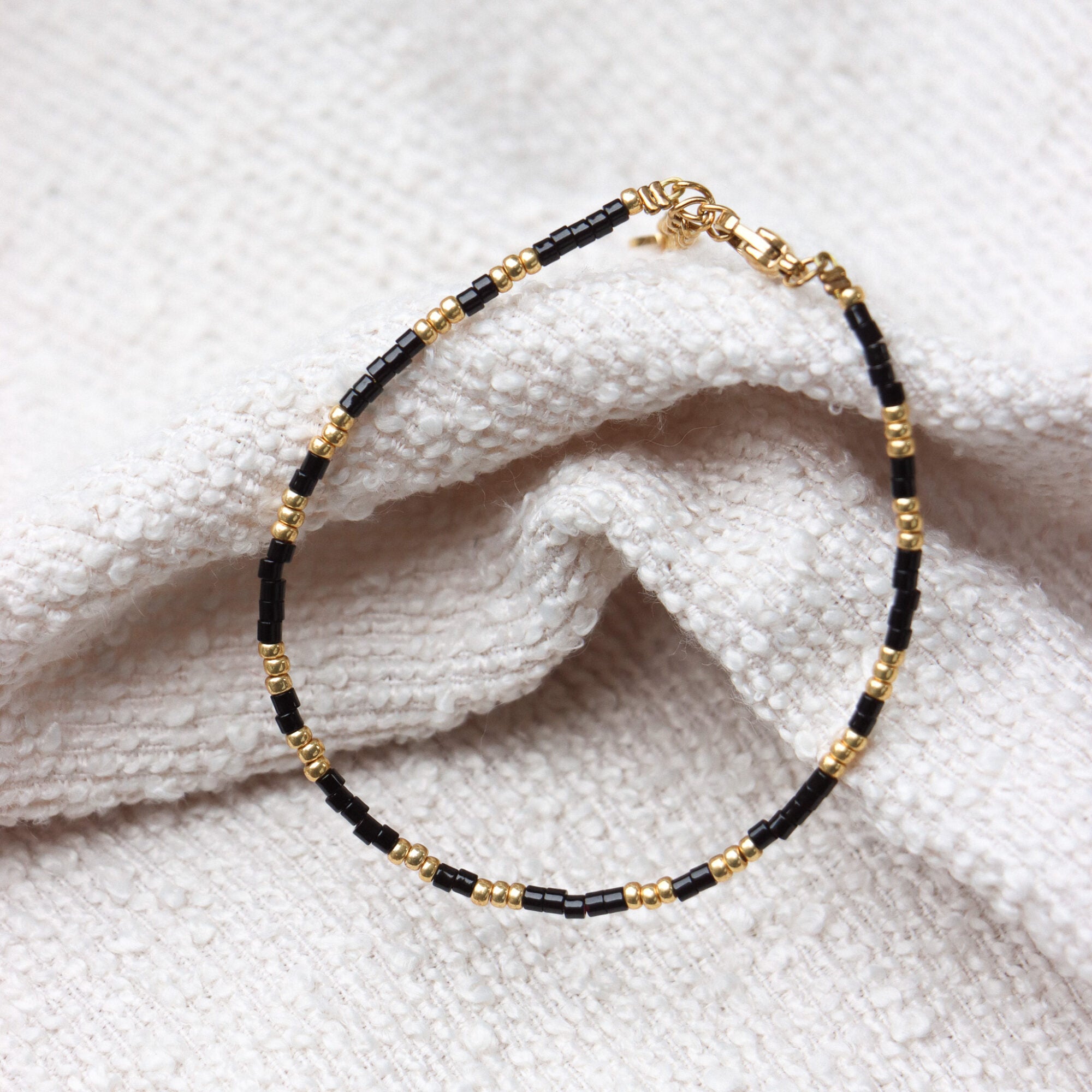 Midnight black bracelet gold