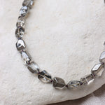 Grey rock necklace gold