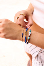Blue tube bracelet gold
