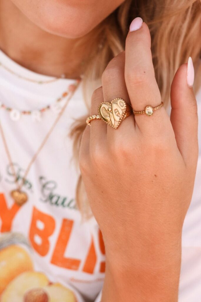 Braided green ring gold