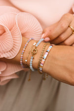 Baby shell bracelet gold