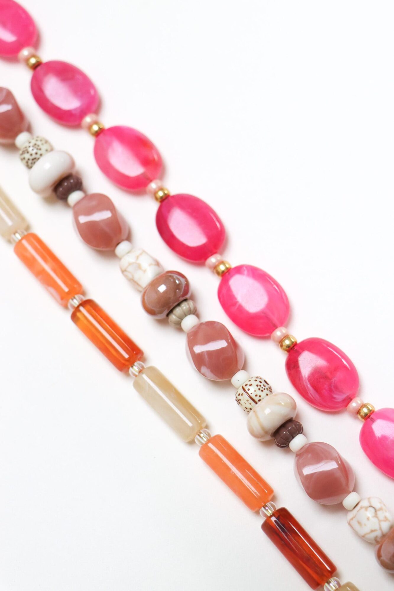 Magenta muse phone cord gold