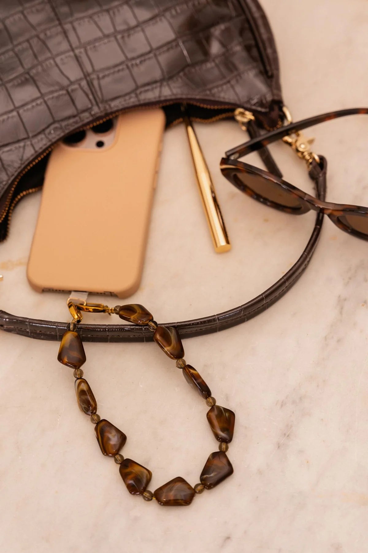Chocolate phone cord gold