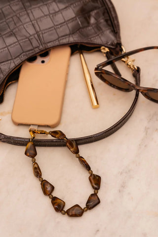 Chocolate phone cord gold
