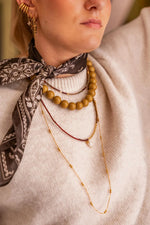 Long dots necklace gold