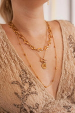 Long dots necklace gold