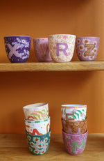 Letter cup